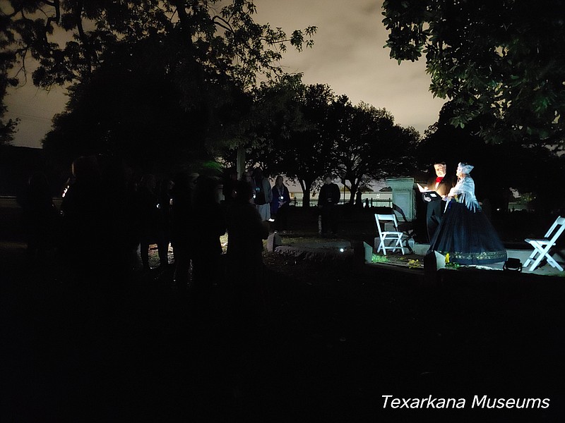 Judith and Larry White perform as Rachel and David Moores at Rose Hill Cemetery. (Texarkana Museums System)
