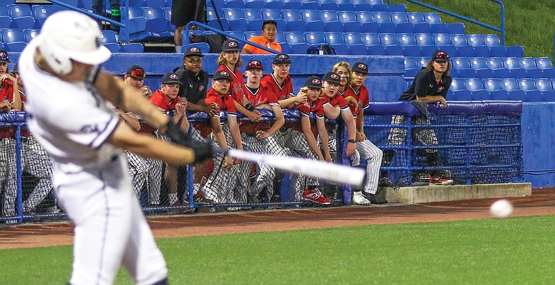 The Jefferson City Jays look on as Fort Zumwalt West's Noah Hargraves hits a two-run single during the first inning of Friday night's Class 6 state semifinal at U.S. Baseball Park in Ozark.
