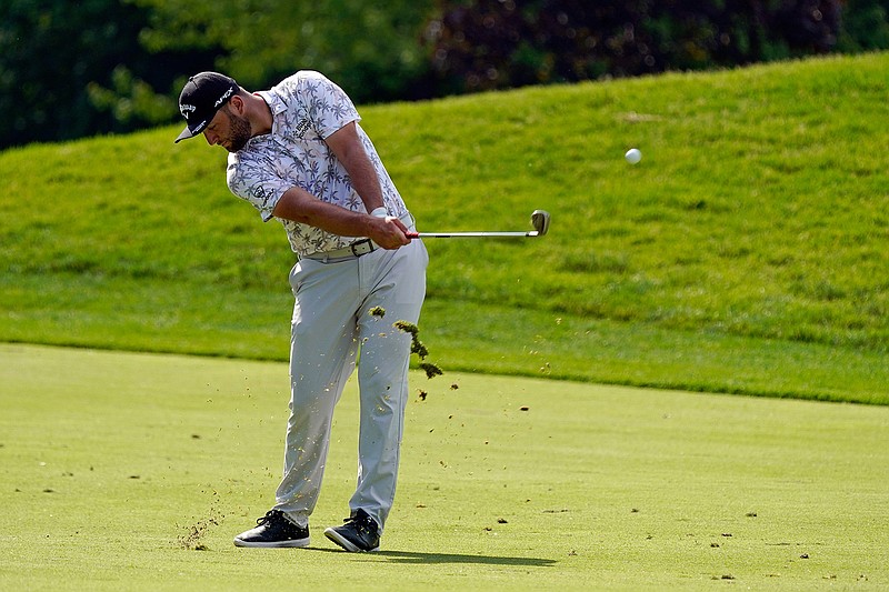 Jon Rahm hits to the 13th green during the third round of the Memorial golf tournament, Saturday, June 5, 2021, in Dublin, Ohio. (AP Photo/Darron Cummings)