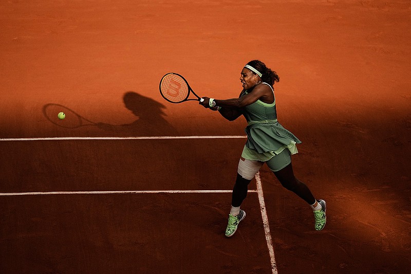 United States' Serena Williams plays a return to Kazakhstan's Elena Rybakina during their fourth round match on day 8, of the French Open tennis tournament at Roland Garros in Paris, France, Sunday, June 6, 2021. (AP Photo/Thibault Camus)