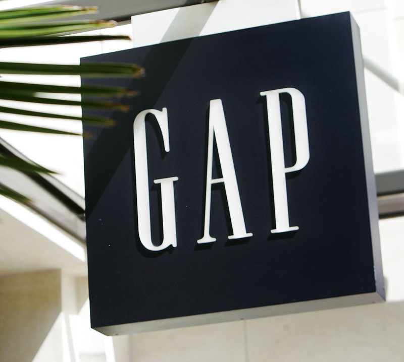 FILE - In this Thursday, April 12, 2007 file photo, A sign at a Gap store is seen in The Grove shopping area in Los Angeles. A dozen retailers including Gap and H&M are collaborating on a campaign this fall to enlist customers to combat bad behavior against retail workers. The campaign is being spearheaded by Open to All and two other groups, and comes as workers face increased harassment as they try to enforce social distancing and mask protocols during the pandemic.  (AP Photo/Reed Saxon, File)