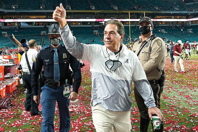 In this Jan. 12 file photo, Alabama coach Nick Saban leaves the field after the Crimson Tide's win against Ohio State in the College Football Playoff national championship game in Miami Gardens, Fla.