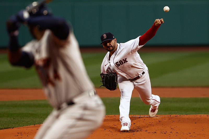 Boston Red Sox starting pitcher Martin Perez delivers against the Houston Astros during the first inning of a baseball game Tuesday, June 8, 2021, at Fenway Park in Boston. (AP Photo/Winslow Townson)