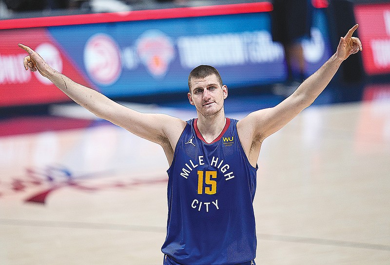 Nuggets center Nikola Jokic celebrates after a playoff win last week against the Trail Blazers in Denver.