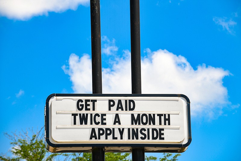 A Jefferson City business looks for employees as evidenced by its help wanted sign. (Julie Smith/News Tribune photo)