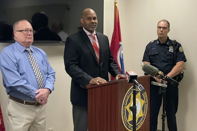 Saadiq Pettyjohn, center, son of Samuel Pettyjohn, speaks at a news conference, Wednesday, June 9, 2021, in Chattanooga, Tenn. Law enforcement officials announced the closing a 42-year-old cold case of Samuel Pettyjohn, a Chattanooga businessman who was shot and killed in 1979 in a contract killing that former Gov. Ray Blanton's administration helped pay for. (AP Photo/Kimberlee Kruesi)