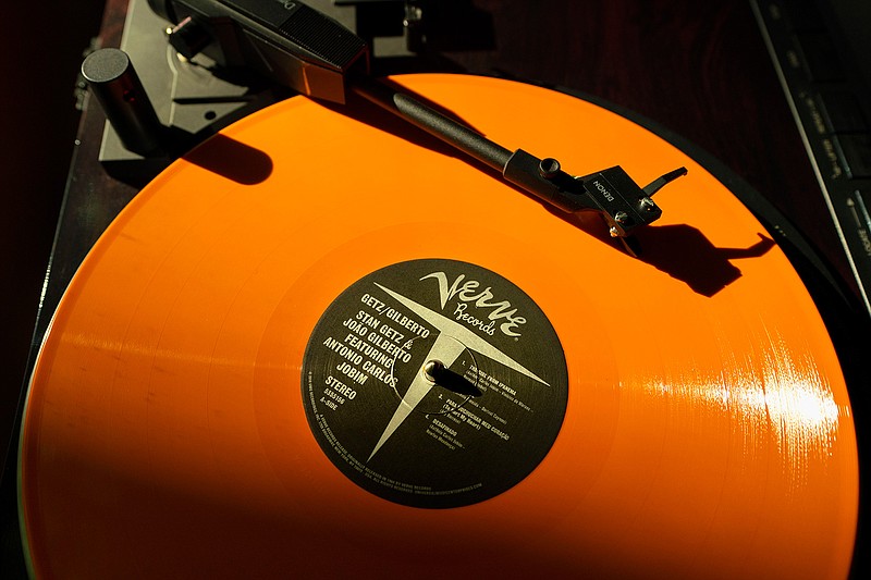 A vinyl record by The Verve plays on a turntable, Thursday, May 27, 2021, in Falmouth, Maine. The COVID-19 pandemic benefitted record store owners who saw a surge in sales. That's good news for the indie record stores ahead of Record Store Day on Saturday, June 12. (AP Photo/Robert F. Bukaty)