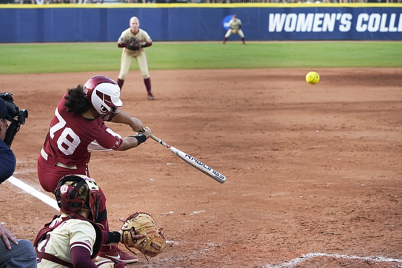 Oklahoma's Jocelyn Alo hits a home run in the sixth inning of the second game of the Women's College World Series championship series Wednesday against Florida State in Oklahoma City.