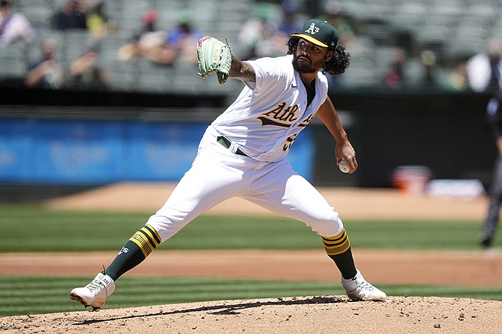 Oakland Athletics starting pitcher Sean Manaea delivers against the Arizona Diamondbacks during the second inning of a baseball game Wednesday, June 9, 2021, in Oakland, Calif. (AP Photo/Tony Avelar)
