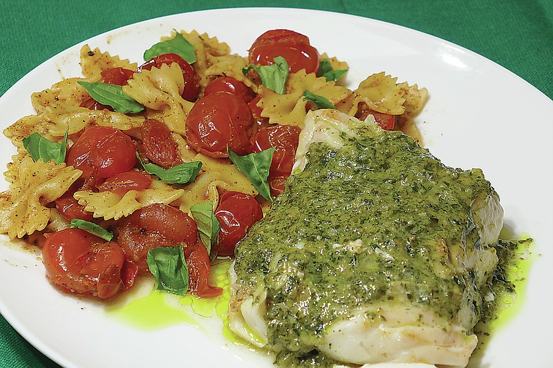 Sauteed Cod with Pesto Sauce and Farfalle with Cherry Tomatoes and Coriander. (Linda Gassenheimer/TNS)