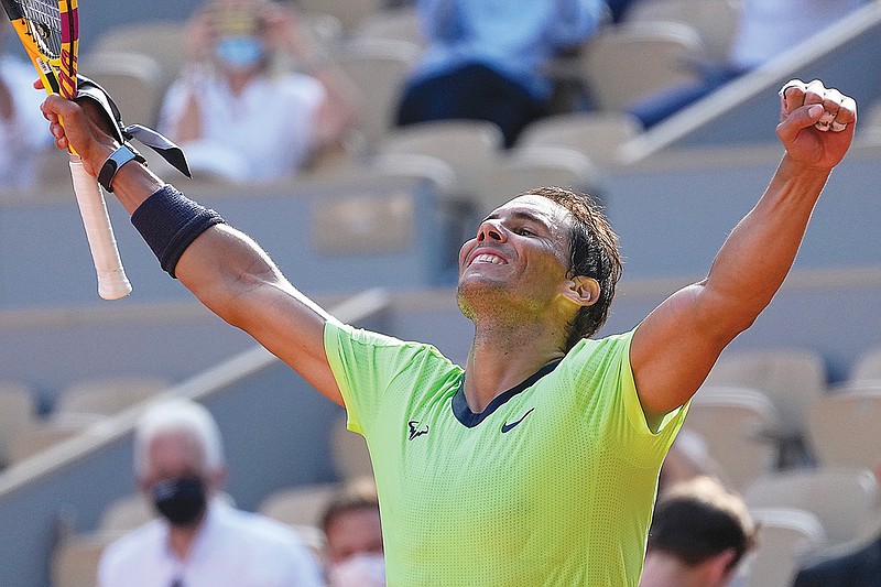 Rafael Nadal celebrates Wednesday after defeating Diego Schwartzman in their quarterfinal match at the French Open in Paris.
