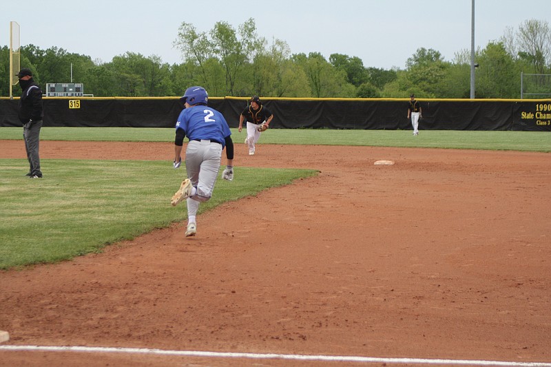 <p>Jeremy Jacob/FULTON SUN</p><p>South Callaway’s Jacob Martin breaks for second base May 10 during the team’s 10-0 loss at Fulton. Martin was one of three underclassmen that were recognized by the Show-Me Conference. Sophomores Martin and JT Thomas and freshman Dane Daughtery were honorable mentions. Junior Jacob Lallier was named to the second team.</p>