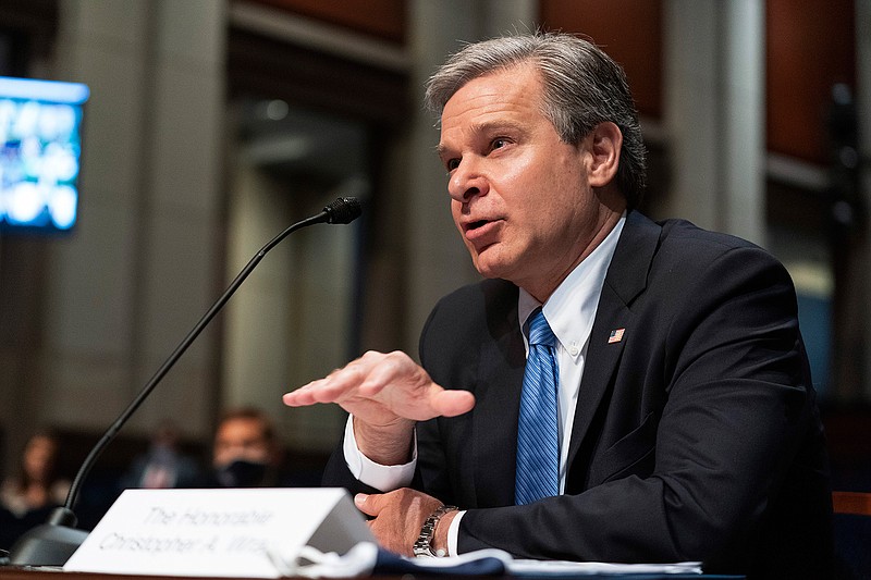 In this Thursday, June 10, 2021, file photo, FBI Director Christopher Wray testifies before the House Judiciary Committee oversight hearing on the Federal Bureau of Investigation on Capitol Hill, in Washington. The FBI says it is getting serious about sexual harassment in its ranks, starting a 24/7 tip line, doing more to help accusers and taking a tougher stand against agents found to have committed misconduct. "There is nothing more important than our people and how we treat each other," Wray said. "I have tried to make it crystal clear that we're going to have zero tolerance for that kind of activity at any level within the organization." (AP Photo/Manuel Balce Ceneta, File)