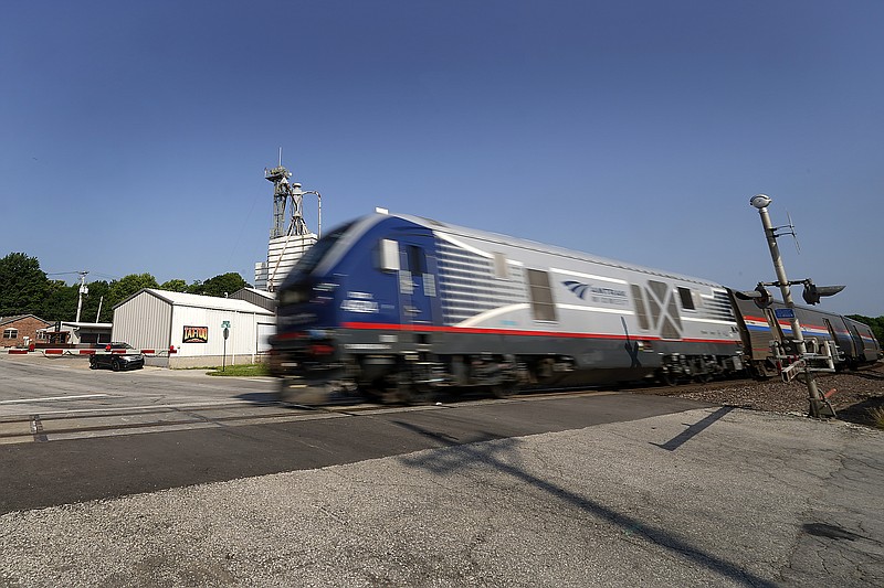 The Missouri River Runner Amtrak train leaves the station en route to St. Louis on Friday, June 11, 2021, in Lee's Summit, Mo. Backers of a proposal to expand passenger rail service through Kansas, Oklahoma and Texas hope the long-discussed package finally has a chance because of an anticipated influx of federal infrastructure funding. (AP Photo/Charlie Riedel)