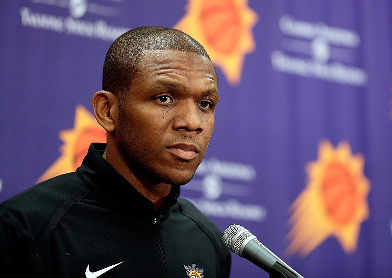 In this April 24, 2019, file photo, Phoenix Suns general manager James Jones speaks to the media regarding the firing of Suns head coach Igor Kokoskov during an NBA basketball news conference in Phoenix. Jones' hiring of coach Monty Williams and acquiring of All-Star guard Chris Paul are two of the biggest reasons why the Suns are in the second round of the playoffs for the first time since 2010. (AP Photo/Matt York, FIle)