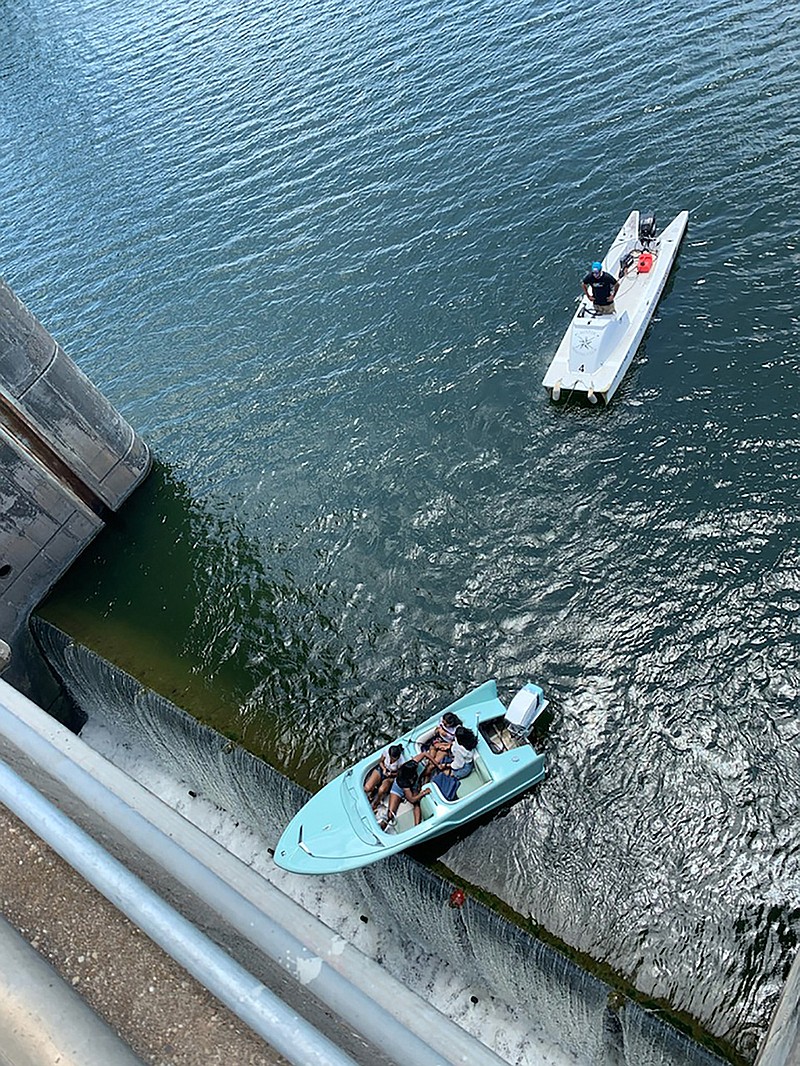 Four women were rescued by Austin, Texas, authorities after the boat they rented got stuck on the edge of Longhorn Dam on June 10, 2021. (Austin-Travis County EMS/TNS)