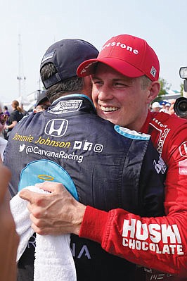 Marcus Ericsson celebrates Saturday with Jimmie Johnson after winning the first race of the IndyCar Detroit Grand Prix doubleheader on Belle Isle in Detroit.