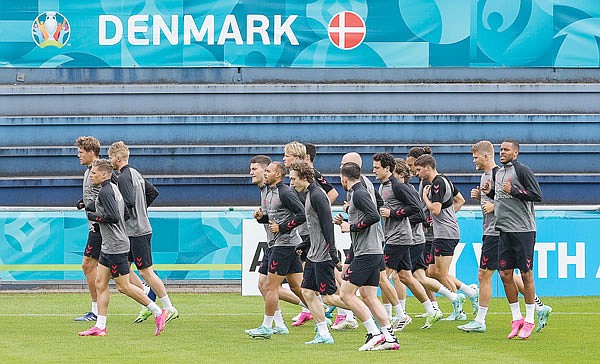 Denmark national team players exercise Monday during a training session in Helsingor, Denmark.