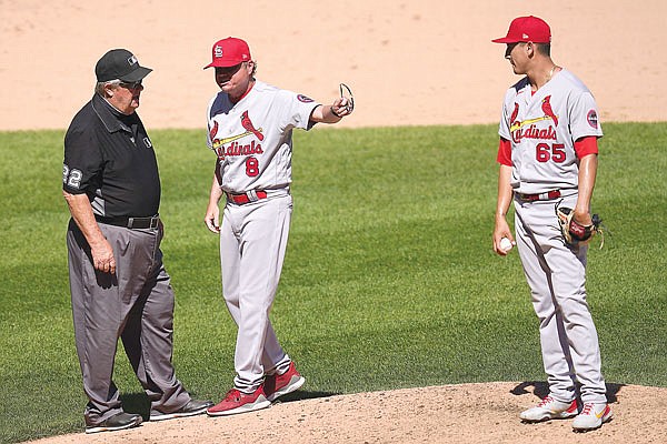 In this May 26 file photo, Cardinals manager Mike Shildt continues to speak his mind as he points to relief pitcher Giovanny Gallegos after umpire Joe West ejected Shildt during the seventh inning of a game against the White Sox in Chicago. West had ordered Gallegos to switch caps because of a substance on the bill of the first one.