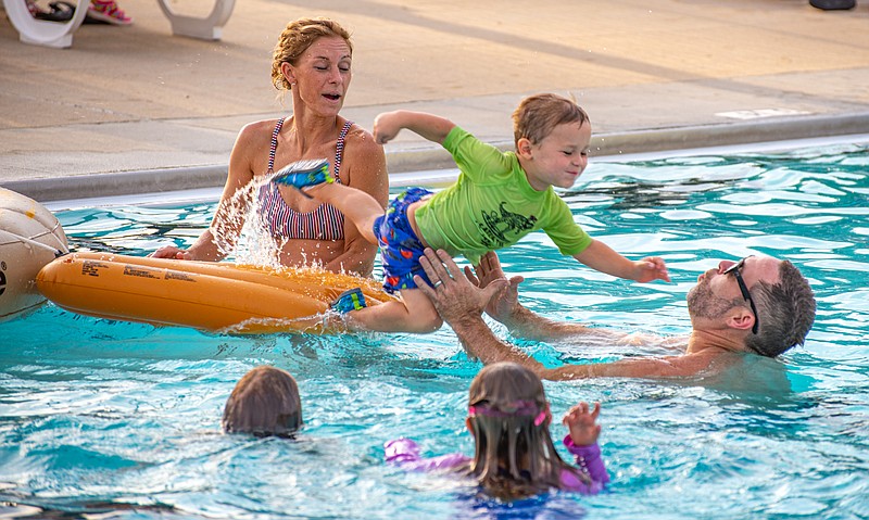 JC Parks Trolls Pool Party at Ellis Porter Pool Friday evening.  (News Tribune\Ken Barnes)