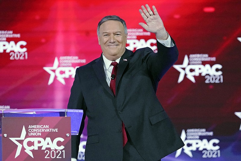 FILE - In this Feb. 27, 2021 file photo, former Secretary of State Mike Pompeo waves as he is introduced at the Conservative Political Action Conference in Orlando, Fla.  Pompeo has become the latest former Trump administration official to launch a political action committee.  (AP Photo/John Raoux, File)