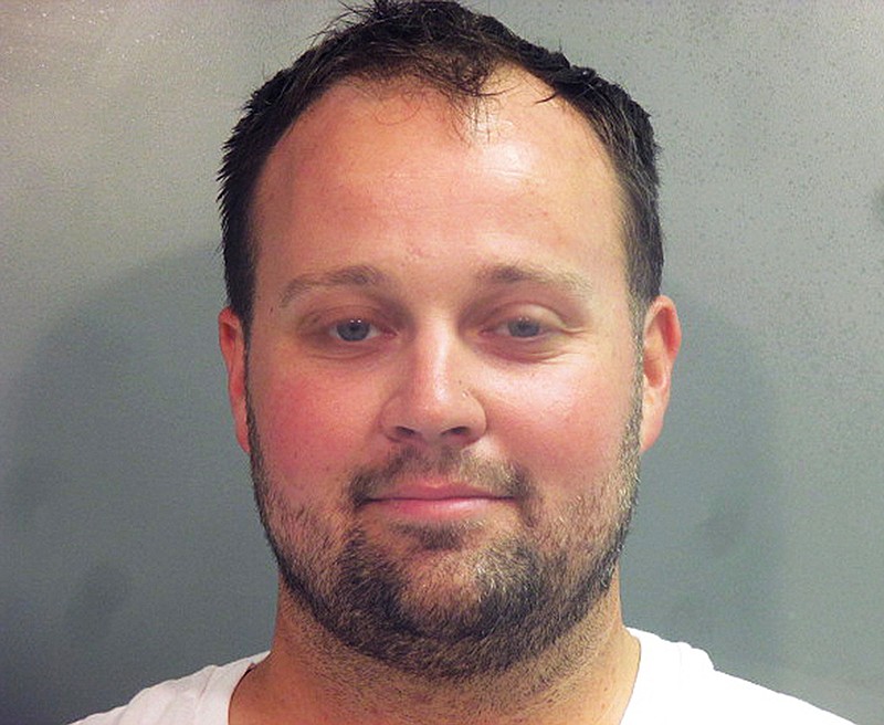 This undated photo provided by the Washington County (Ark.) Jail shows Joshua Duggar. Former reality TV star Duggar's trial on child pornography charges has been moved to November. U.S. District Judge Timothy L. Brooks on Tuesday, June 29, 2021, granted Duggar's request to delay his trial, which had originally been scheduled to begin July 6. (Washington County Arkansas Jail via AP, File)