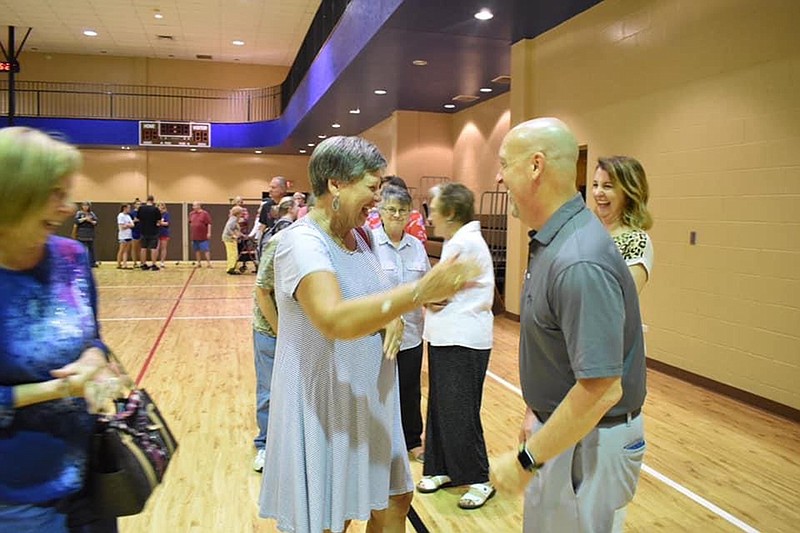 Barbara Minor and Barbara McWilliams, from left, greet Craig and Melanie Jenkins in the receiving line at the Rev. Craig Jenkins' farewell reception at Beech Street Baptist Church in Texarkana. (Submitted photo)
