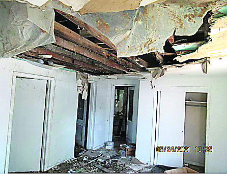 The building at 431 W. Miller was originally lower on the city's list for demolition, but was recently moved up because of the collapsed interior and frequent break-ins.