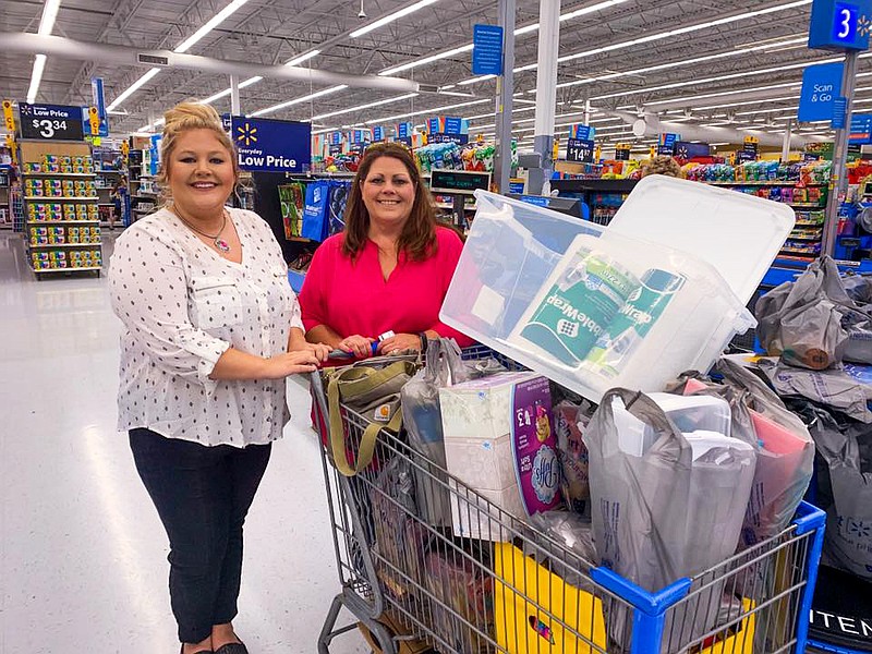 Callaway Chamber of Commerce marketing and events coordinator Justis Smith, left, and executive director Tamara Tateosin are shown in 2019 shopping for the Tag-A-Teacher haul. Though the items for this year's giveaway may be different, they're excited to celebrate and recognize a teacher for all that they do.