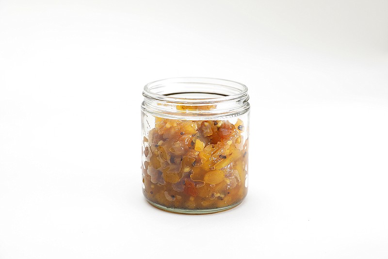 Mezcal adds an earthy, smoky tinge to tropically sweet pineapple in this chutney perfumed with whole vanilla bean pod. Pineapple Chutney With Mezcal and Vanilla Bean. (Christina House/Los Angeles Times/TNS)