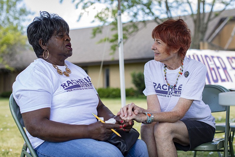 Rachelle Zola, right, comforts her friend Mazell Sykes while Sykes discusses her childhood in Mississippi on Monday, June 14, 2021, outside Cosmopolitan United Church in Melrose Park. Zola began a 40-day all-liquid hunger strike to support H.R. 40, a House bill that would set up a commission to study reparations. (Brian Cassella/Chicago Tribune/TNS)