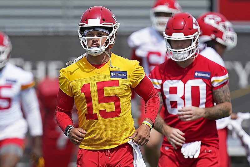 In this June 16 file photo, Chiefs quarterback Patrick Mahomes warms up during the team's minicamp in Kansas City.