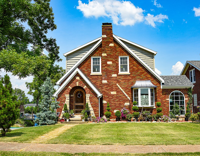 Julie Smith/News Tribune
Charlotte Russell's home at 314 Woodlawn has been named the most recent winner of the Golden Hammer Award. Her home was hit very hard in the May 2019 tornado and now her home is back as it was.