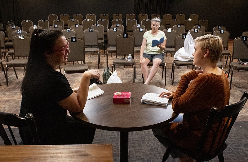 <p style="text-align:right;">Charlotte Renner/For the News Tribune</p><p><strong>Rachel Steinmeier, playing Della, and Jessi Green, as Jen, rehearse scenes for Scene One Theatre’s upcoming production of “The Cake.” Director Mary Jo LaCorte looks on.</strong></p>