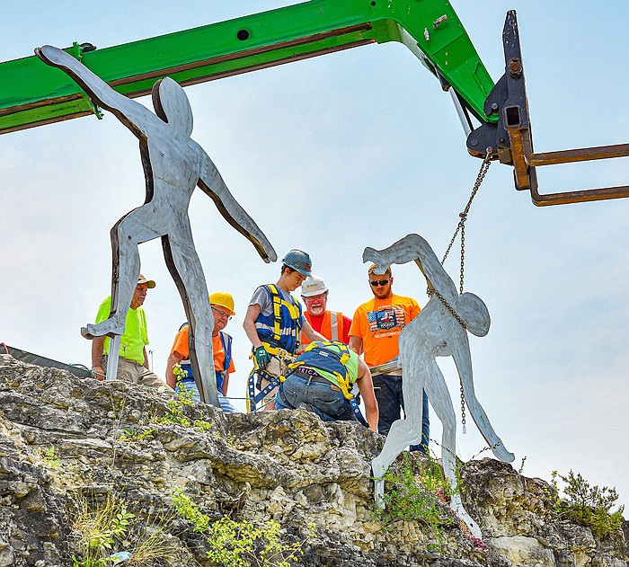 In a cooperative effort between students in Nichols Career Center welding class and Capital Region Medical Center Art Committee, the initial phase of an art installation project began Wednesday, July 14, 2021, at CRMC, just off the main entrance parking lot. The sculptures are stainless steel, designed by students in mechatronics class and fabricated by the welding class. The individual pieces were made using a plasma cutter, then welded, ground off and buffed. DeLong's Steel and Harold G. Butzer donated materials for the project, Welding instructor Ken Thomas and four current and recent students worked with volunteers from Capital Region to get the pieces mounted.