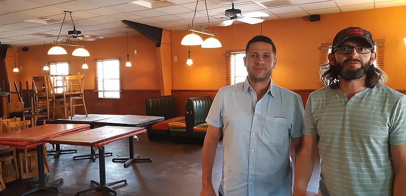 Alfonso Moreno, right, along with his wife, Carrie, not pictured, are the new owners of the former Fiesta House in Nash, Texas. Alberto Sanchez, left, is the head cook.