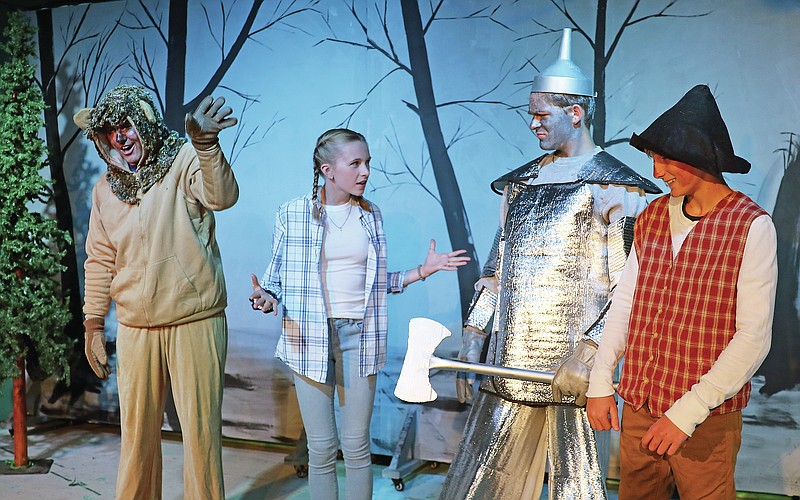 Jason Strickland/News Tribune
Stephen Henady, as the Cowardly Lion, Addison Suthoff, as Dorothy, Grayson Janeczko, as Tin Man, and Kaiden Caudle, as Scarecrow, rehearse a scene for the play "Missionary of Oz" at Stained Glass Theater.