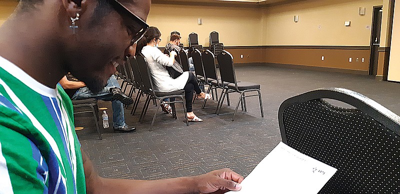 Talveyion Cooper, 20, former football player for Liberty-Eylau High School, waits for his tryout-of-a-different-kind. Talent scouts with ARTS International were auditioning prospective performers in Texarkana on Friday and Cooper wanted to give this a try.