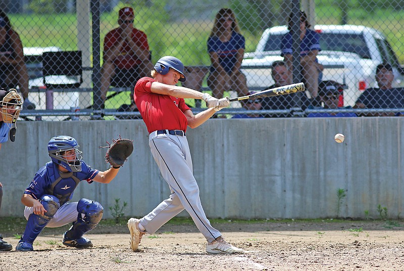 Nate Roark of the Jefferson City Post 5 Juniors hits a single Saturday during a Zone 1 Tournament game against Washington Post 218 at Loose Creek Community Club.