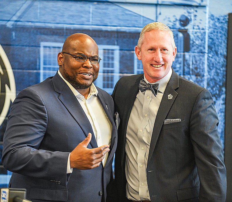 Kevin Wilson (left) stands with Lincoln University interim president John Moseley after being introduced as the school's athletic director Monday, July 12, 2021, at Jason Hall.