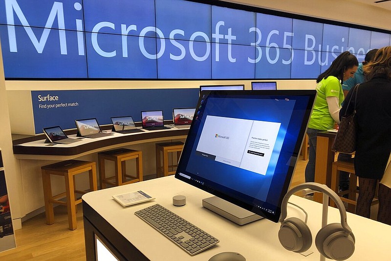 FILE - In this Jan. 28, 2020, file photo, a Microsoft computer is among items displayed at a Microsoft store in suburban Boston. The Biden administration on Monday, July 19, 2021, blamed China for a hack of Microsoft Exchange email server software that compromised tens of thousands of computers around the world earlier in the year. (AP Photo/Steven Senne, File)