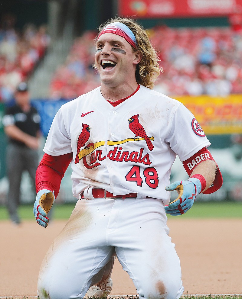 Harrison Bader of the Cardinals celebrates after beating out an infield single for an RBI in the seventh inning of Sunday afternoon's game against the Giants at Busch Stadium.