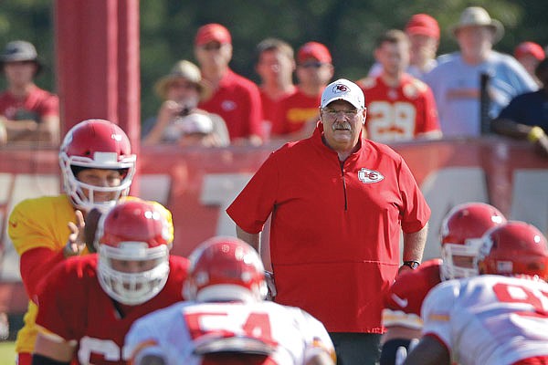 In this July 29, 2019, file photo, Chiefs coach Andy Reid watches a drill during football training camp in St. Joseph.