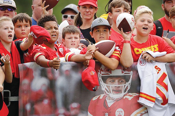 In this Aug. 2, 2019, file photo, Chiefs fans wait for autographs during training camp in St. Joseph.