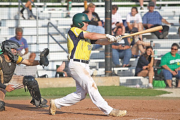 Josef Keilholz of the Jefferson City Renegades follows through on his swing as he hits an RBI double during the sixth inning of Game 1 in Sunday's doubleheader against the Des Moines Peak Prospects at Vivion Field.