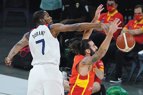 Kevin Durant of the U.S. blocks a shot by Spain's Ricky Rubio during Sunday night's exhibition game in Las Vegas.