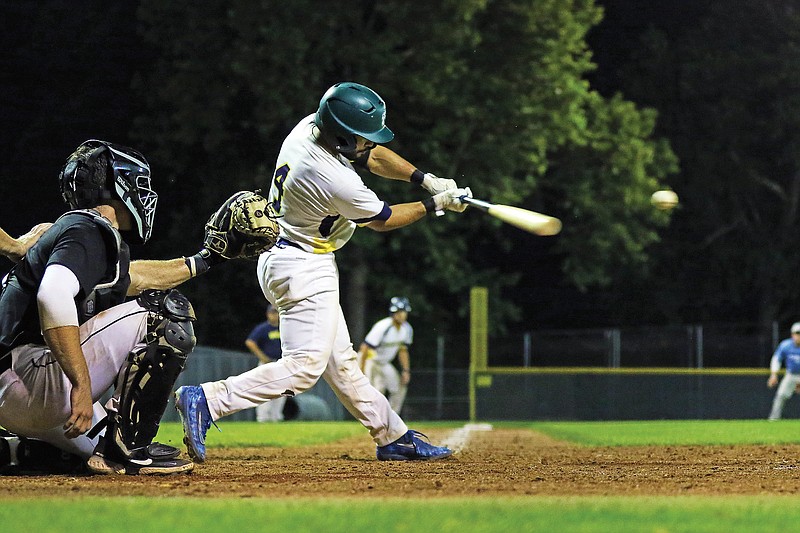 Ale Claro of the Jefferson City Renegades sends the ball to left field for a game-tying RBI double during the ninth inning of Tuesday night's game against the Jefferson City Legends at Vivion Field.