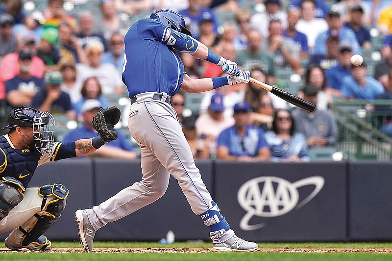 Ryan O'Hearn of the Royals hits a two-run home run during the seventh inning of Tuesday afternoon's game against the Brewers in Milwaukee.