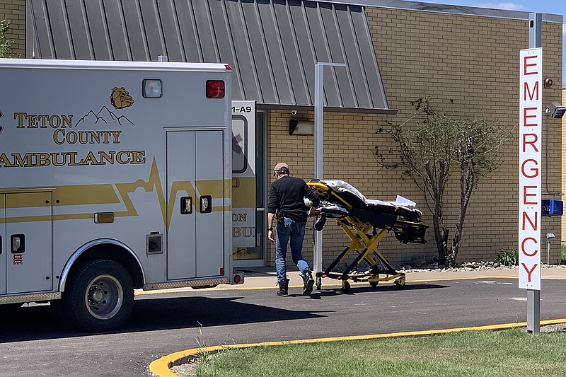 A Teton County EMS volunteer wheels a stretcher into Benefis Teton Medical Center in Choteau, Montana, on June 1, 2021. (Aaron Bolton/Kaiser Health News/TNS)