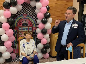 Fran Wyatt, left, is honored with a  "Celebration of Service" upon her retirement after 20 years as a volunteer at CHRISTUS St. Michael Hospital in Atlanta, Texas. Brett Kinman is the speaker.(Submitted photo)